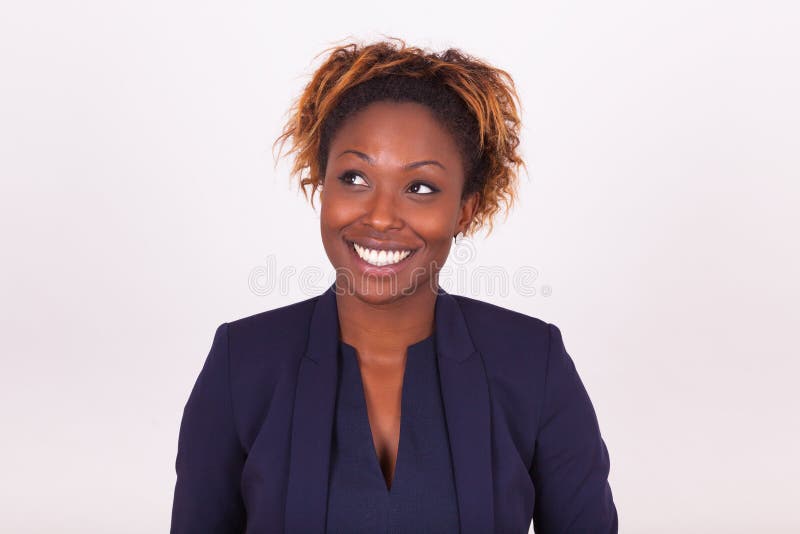 African American business woman looking up