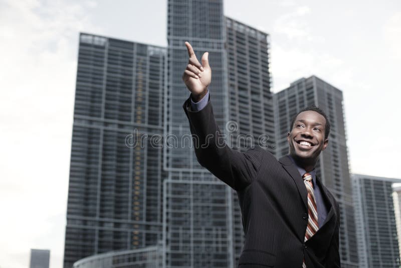 African American businessman waving