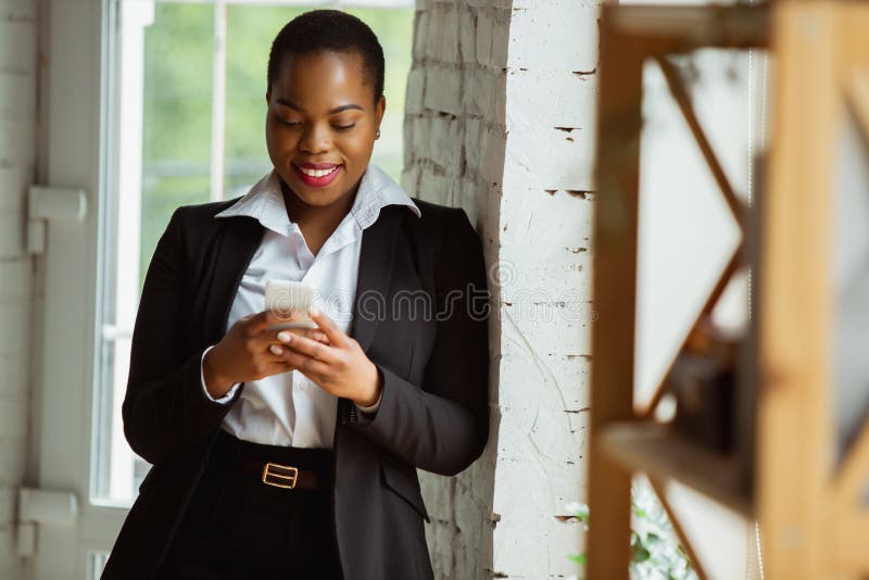 African American Businesswoman In Office Attire Smiling Looks Confident And Happy Successful