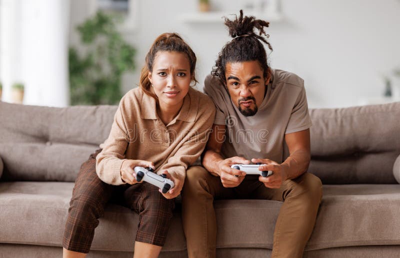 African American Boyfriend Winning Video Game Girlfriend Stock Photo by  ©EdZbarzhyvetsky 181571646