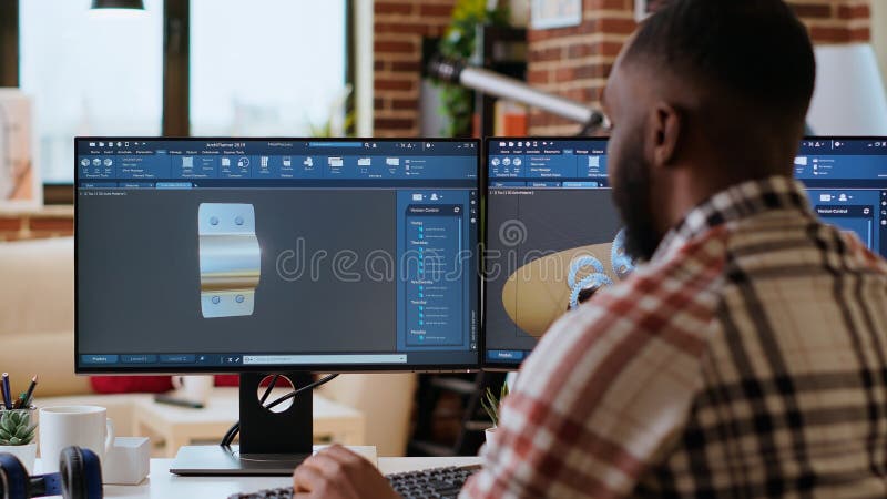 African american designer uses 3D modeling tools and CAD software royalty free stock photography