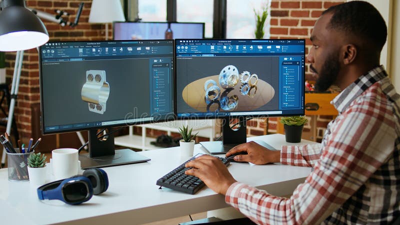 African american designer uses 3D modeling tools and CAD software stock image