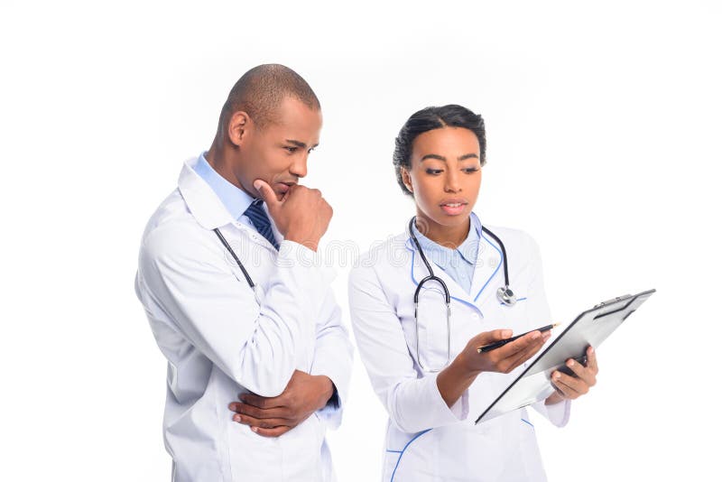 african american doctors in white coats with stethoscopes and diagnosis