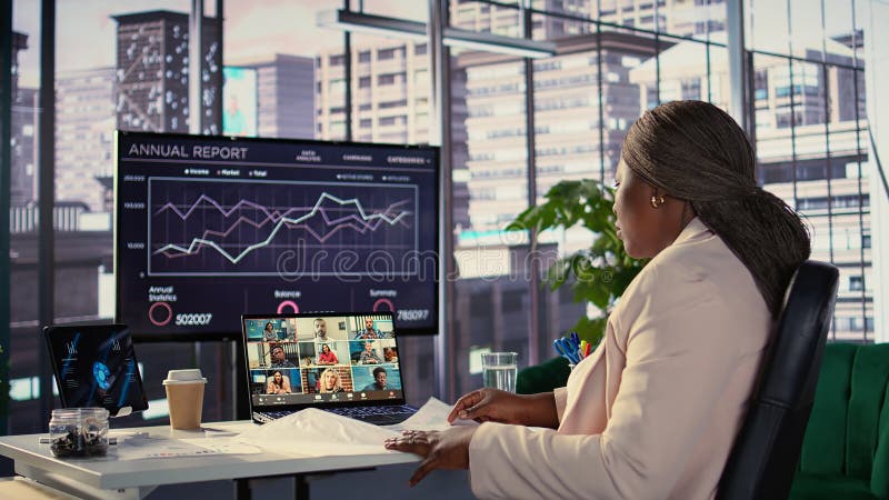 African american entrepreneur pitching a new project idea to stakeholders stock photo