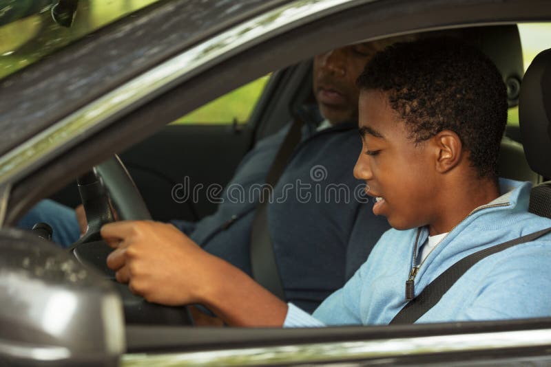 Father Teaching His Son How To Drive. Stock Photo - Image of cheerful ...