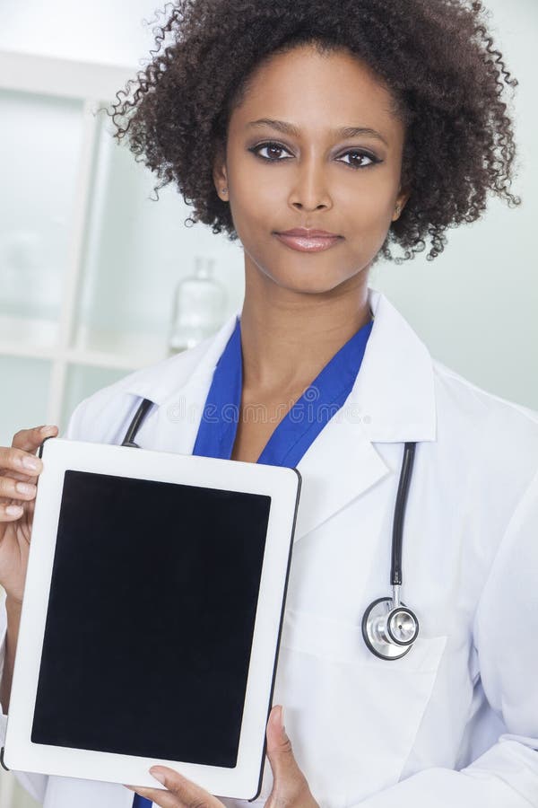 African American Female Doctor & Tablet Computer