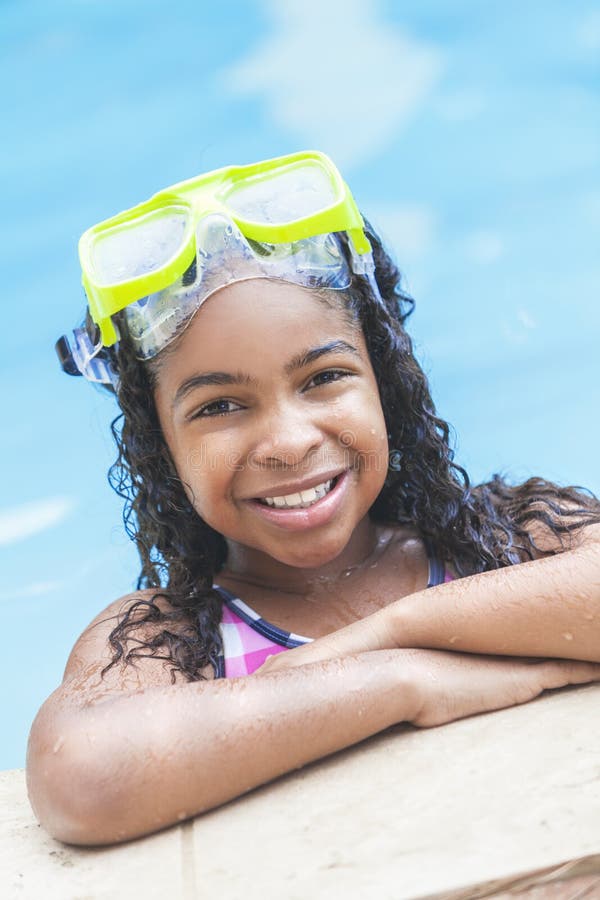 African American Girl Child In Swimming Pool stock image African American Girl Child In Swimming Pool stock image