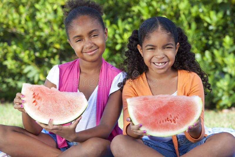 African American Girls Children Eating Water Melon royalty free stock photos African American Girls Children Eating Water Melon royalty free stock photos