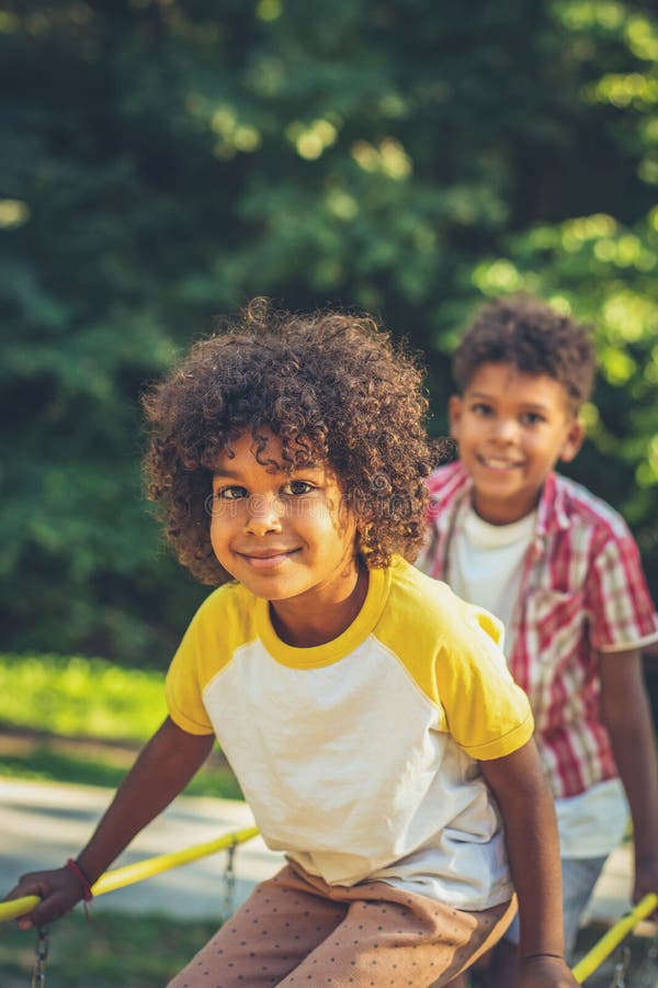 African American Kids Playing on Bridge. Stock Image - Image of child ...