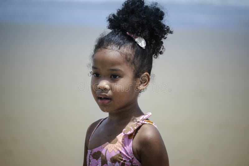 African American Little Girl Kid Having Fun On Sandy Summer Beach With