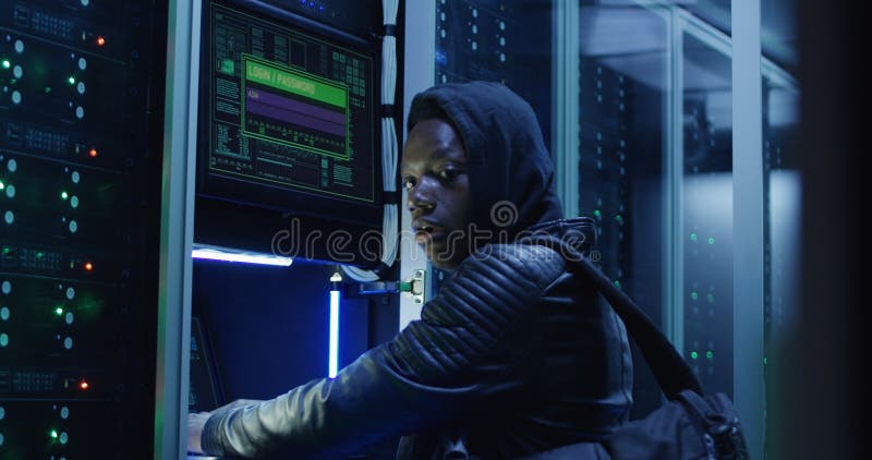 Black Man Hacking Computer System in Server Room Stock Photo - Image of  center, black: 130140280
