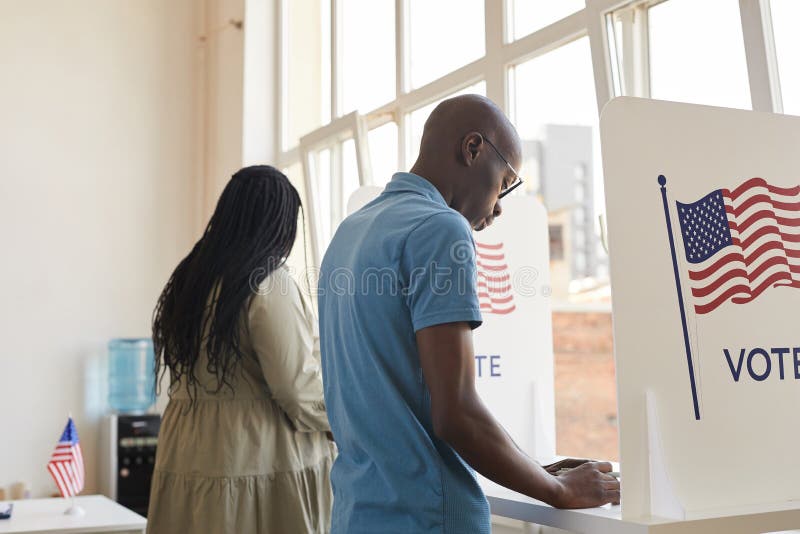 African-American People in Voting Booth royalty free stock photo