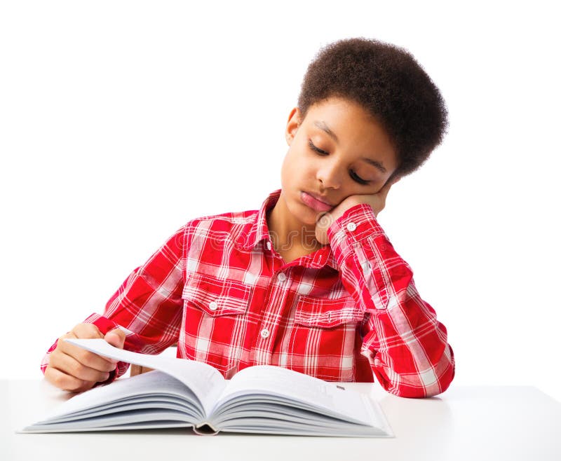 African American school boy reading book without interest