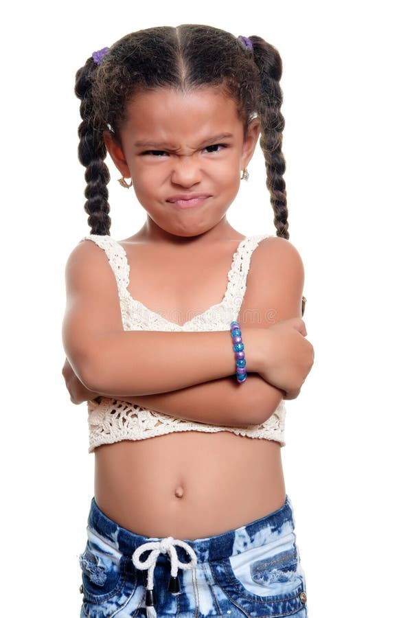 African american small girl with an angry face isolated on a white background. African american small girl with an angry face isolated on a white background