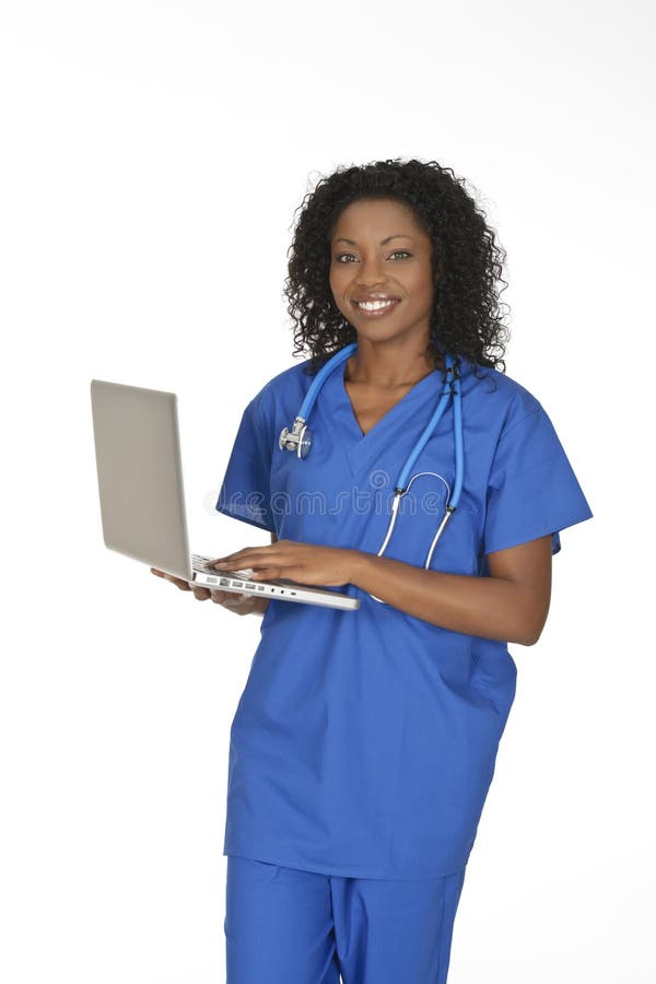 African American woman doctor or nurse holding a laptop computer