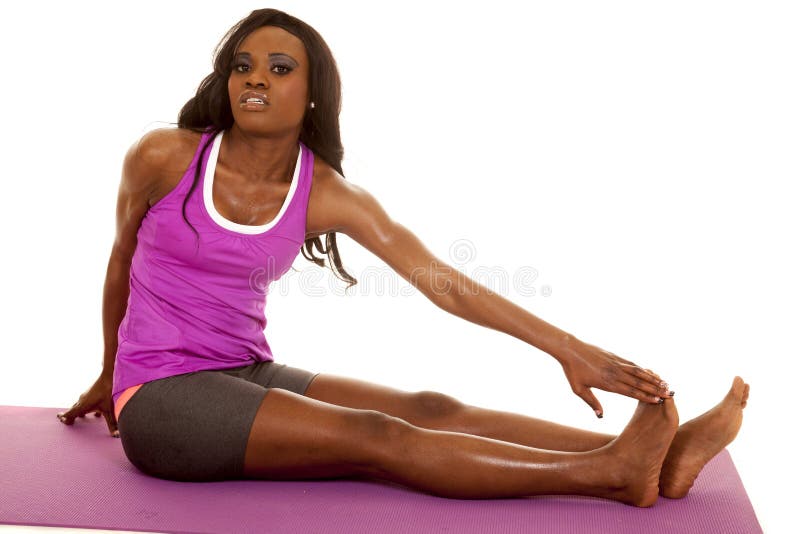 African American woman fitness purple sit side stretch