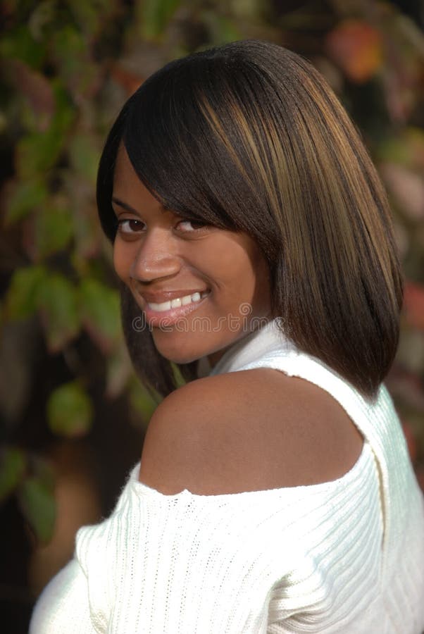 African-American woman looking an smiling stock photography