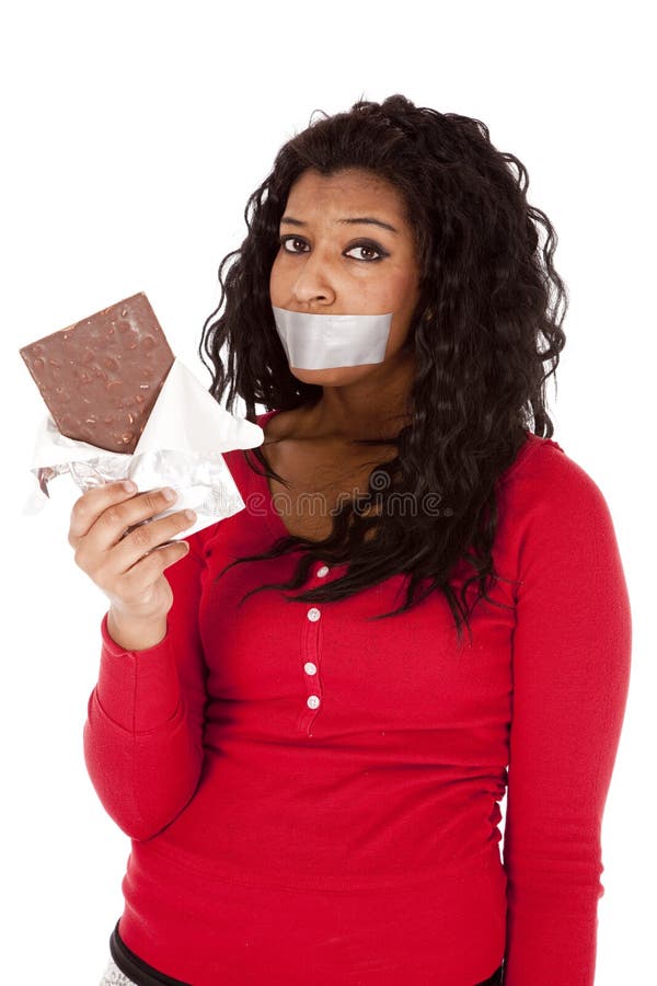 African American woman mouth taped chocolate