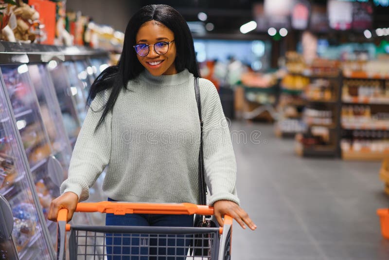 African American Woman at Supermarket with Shopping Cart Stock Image ...