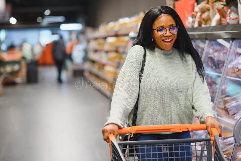 African American Woman at Supermarket with Shopping Cart Stock Image ...