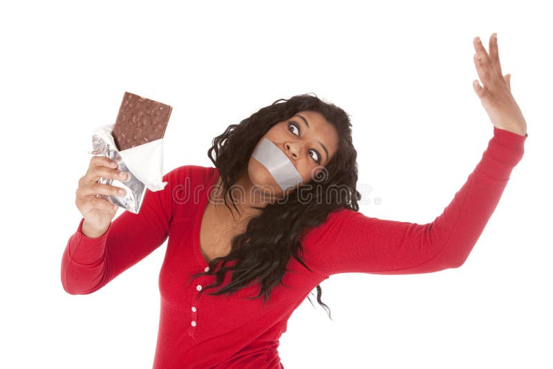 African American woman taped mouth wants chocolate