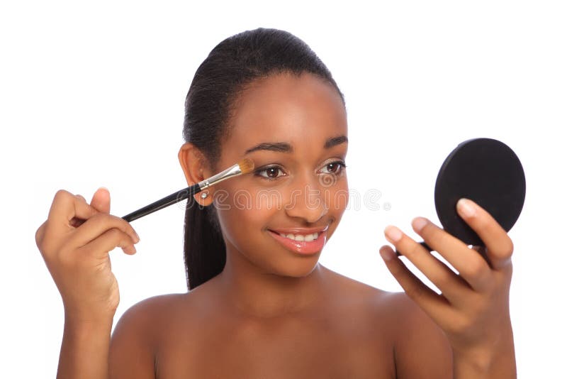 African american woman using eye shadow brush royalty free stock image African american woman using eye shadow brush royalty free stock image
