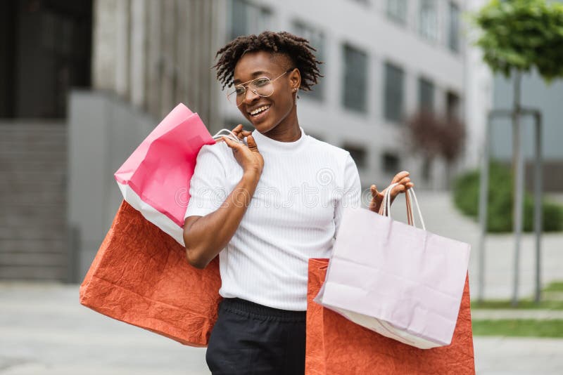 African American Woman Wearing Casual Clothes, Enjoying Her Walk and ...