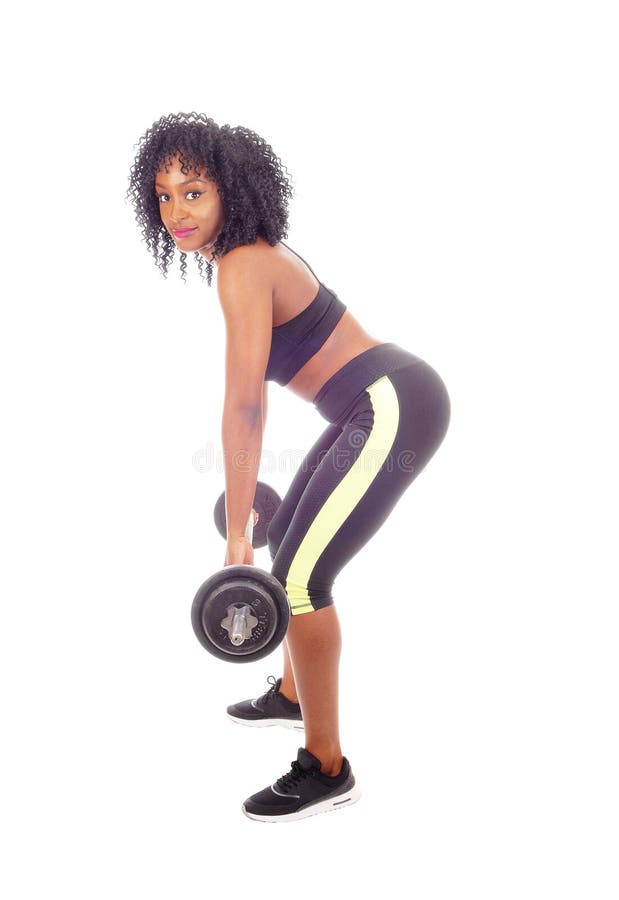 A Woman Lifting Dumbbells · Free Stock Photo