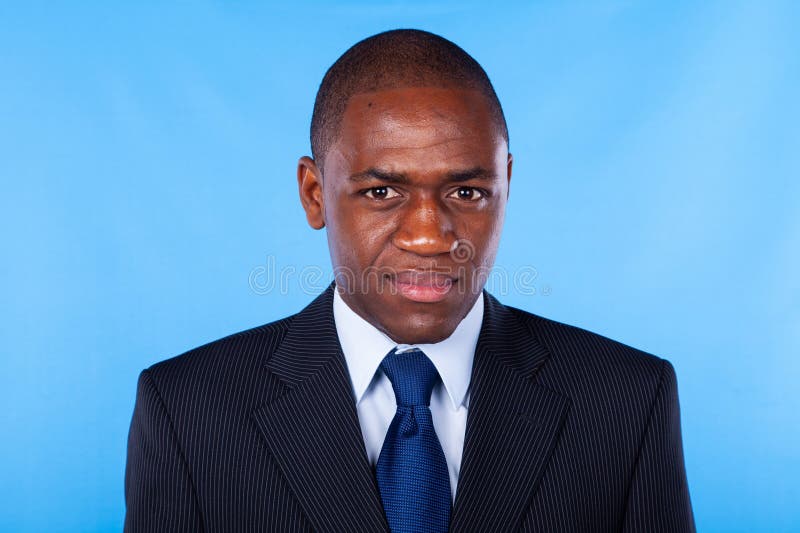 African businessman portrait blue background foto de stock