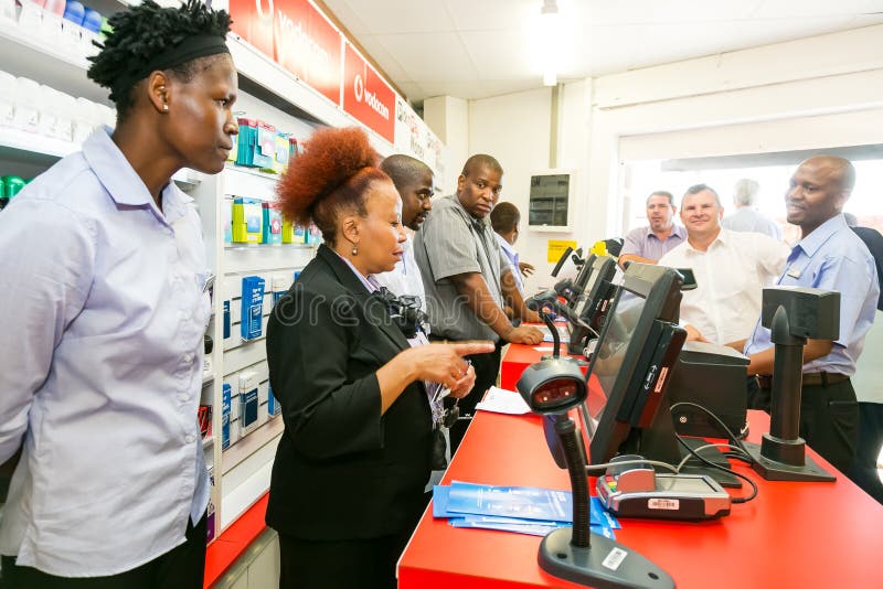 African Cashier And Customer At Checkout At Local Pick N ...