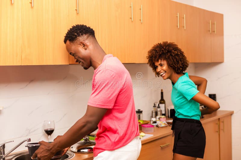 African American Couple Preparing Food In The Kitchen Stock Image Image Of Indoors Descent 