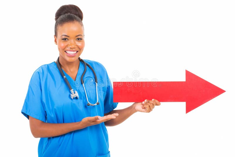 Friendly african medical doctor pointing direction with arrow. Friendly african medical doctor pointing direction with arrow