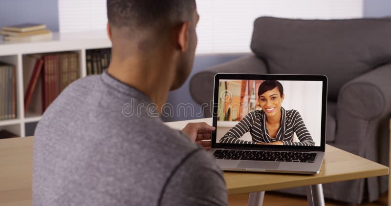 African friends video chatting on laptop royalty free stock photo African friends video chatting on laptop royalty free stock photo