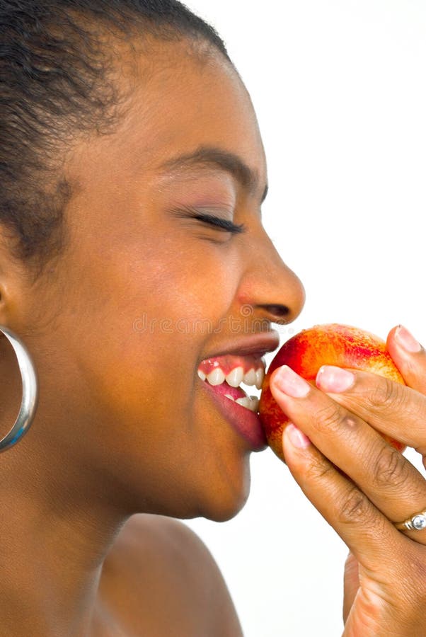 African girl with a peach