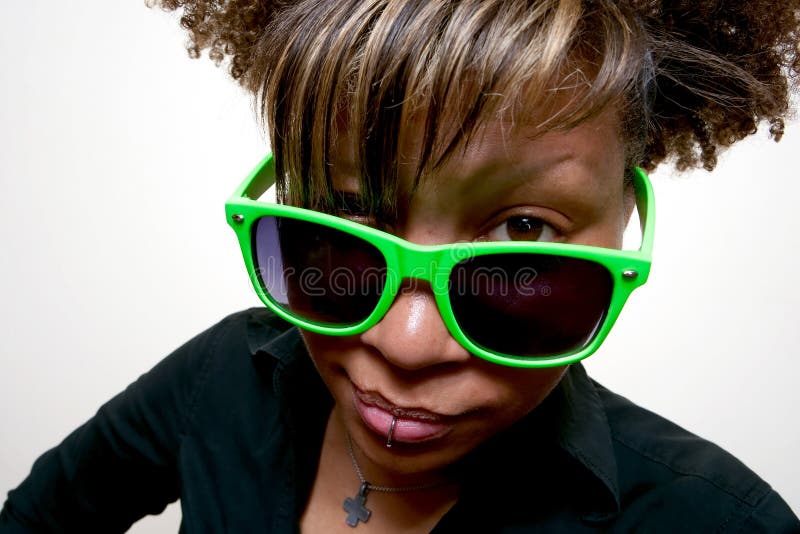 African Girl Staring Over Green Glasses