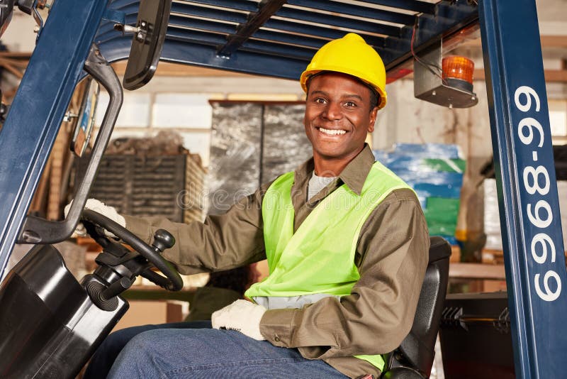 African man as a forklift driver
