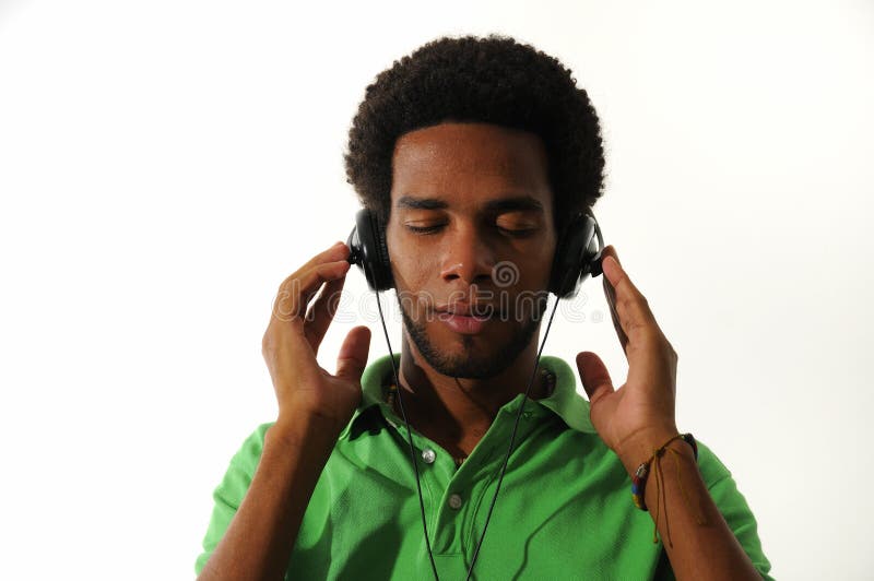 African man enjoying music with headphones