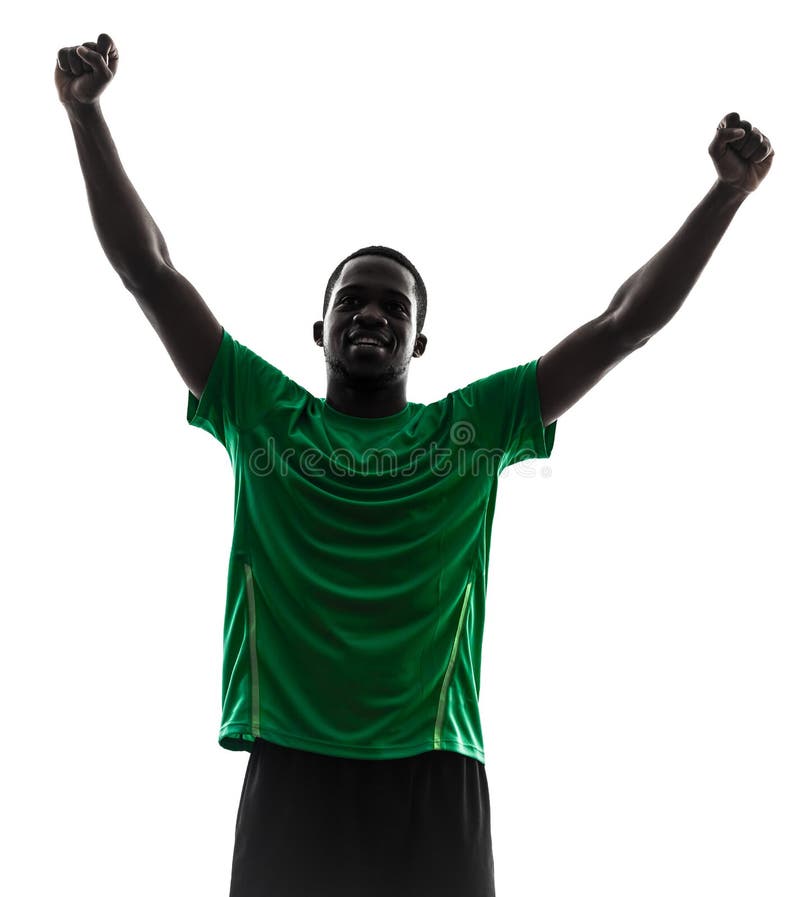 African man soccer player celebrating victory silhouette