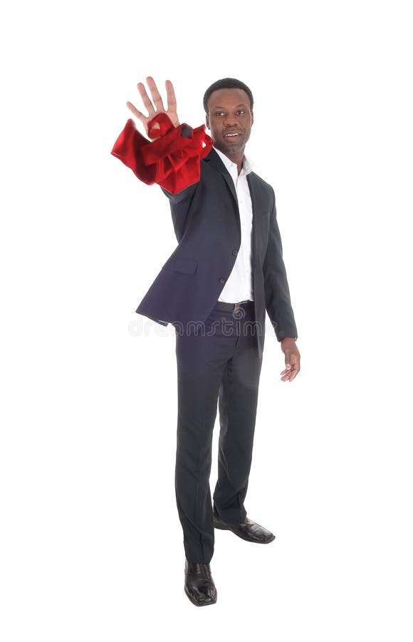 African man throwing his red tie away