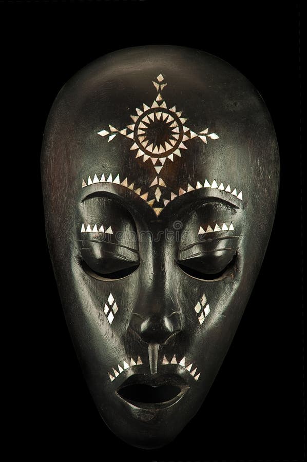 African mask isolated on black