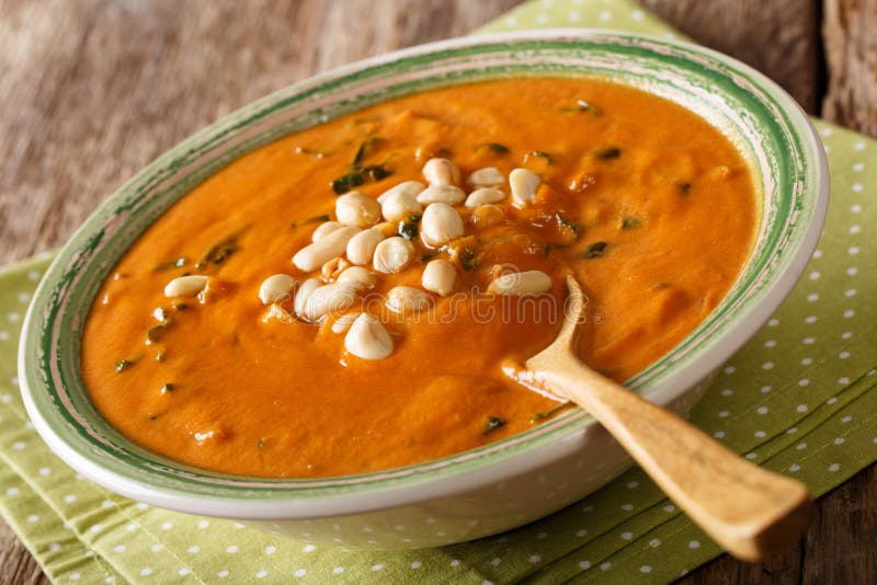 African peanut cream soup close-up on a plate. horizontal