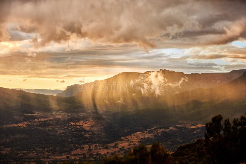 African sunset. Dramatic view of sunset over slopes of Bale mountains covered in Harenna forest, Ethiopia, Africa.