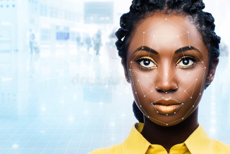 Close up portrait of attractive african woman with facial recognition technology. Grid with reference areas marked on face. Young girl against out of focus airport background. Close up portrait of attractive african woman with facial recognition technology. Grid with reference areas marked on face. Young girl against out of focus airport background.