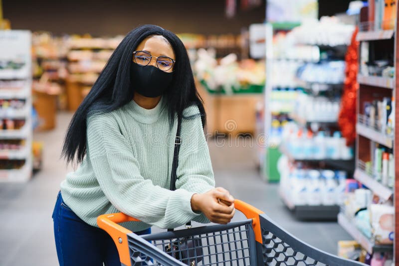 African Woman Wearing Disposable Medical Mask Shopping in Supermarket ...