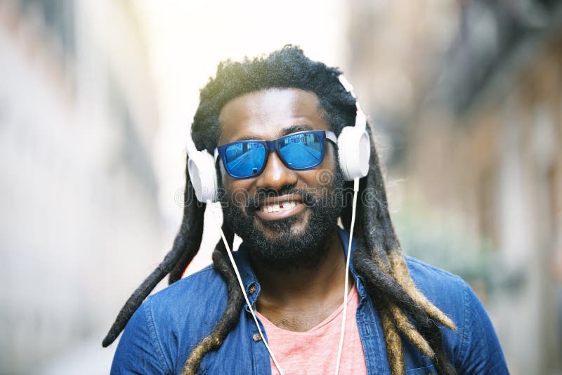 African Young Man Listening Music. Stock Photo - Image of casual ...