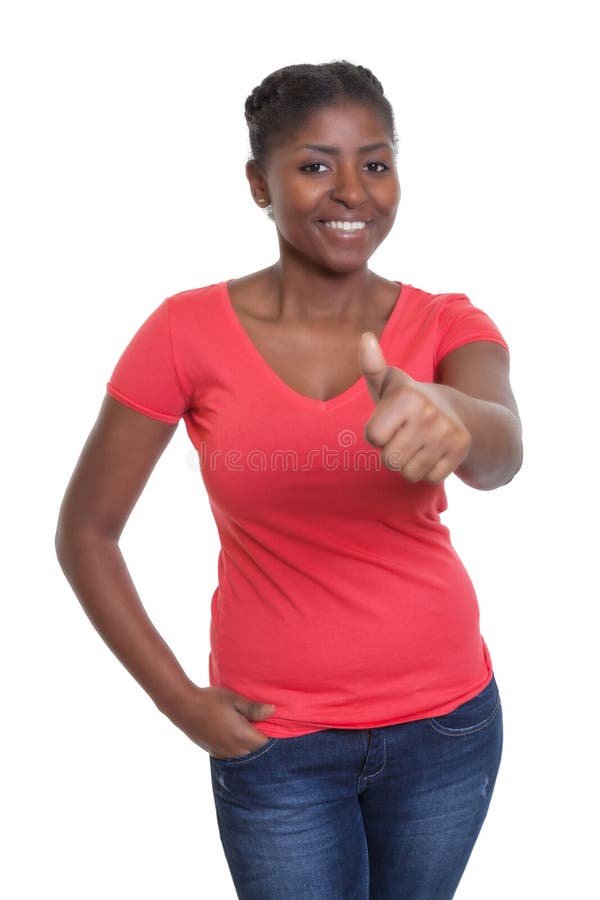 African american woman in a red shirt showing thumb up on an isolated white background for cut out. African american woman in a red shirt showing thumb up on an isolated white background for cut out