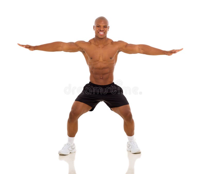 Fit african man exercising and stretching on white background. Fit african man exercising and stretching on white background