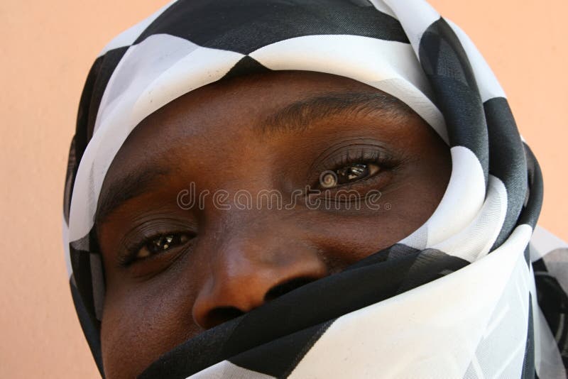 African muslim woman with a black and white veil. African muslim woman with a black and white veil