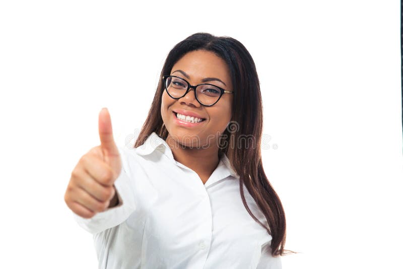 Afro american businesswoman in glasses showing thumb up isolated on a white background. Looking at camera. Afro american businesswoman in glasses showing thumb up isolated on a white background. Looking at camera