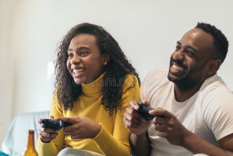 African American Boyfriend Winning Video Game Girlfriend Stock Photo by  ©EdZbarzhyvetsky 181571646